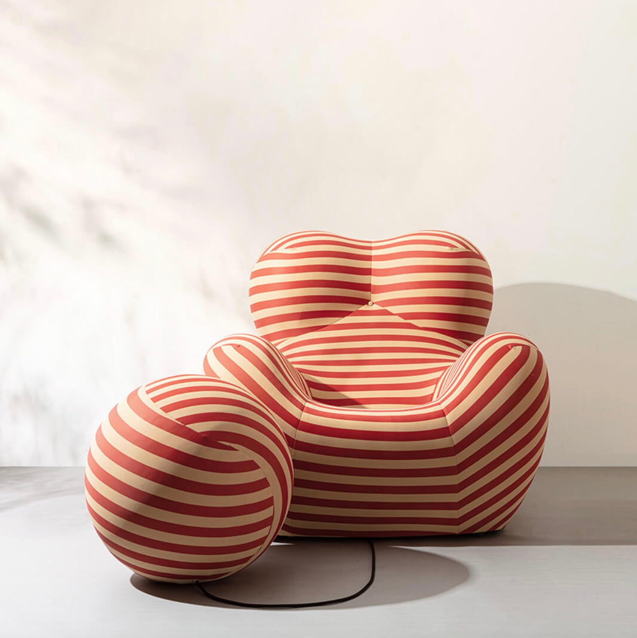 Striped cuddle with ottoman